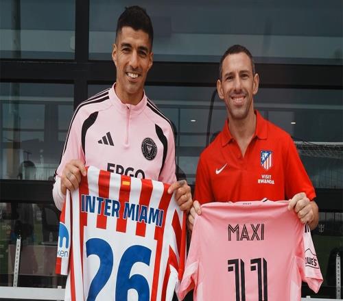 馬競在邁阿密舉辦活動，馬克西與蘇亞雷斯合影留念